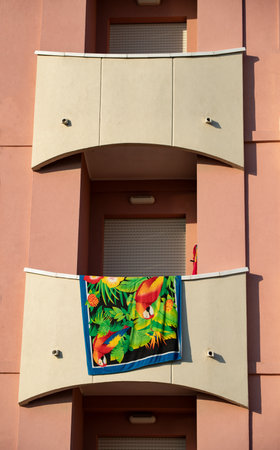Detail of the facade of a modern building with a colorful facadeの写真素材