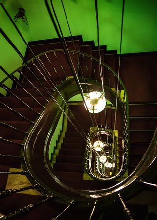 Spiral staircase in an old house in Prague, Czech Republicの写真素材