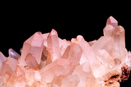 closeup of sample of natural mineral from geological collection - Amethyst gemstone on black backgroundの写真素材