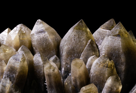 Macro shooting of natural mineral rock specimen - unpolished quartz crystals on black backgroundの写真素材