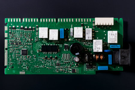 Electronic circuit board on a black background. Close-up.の写真素材