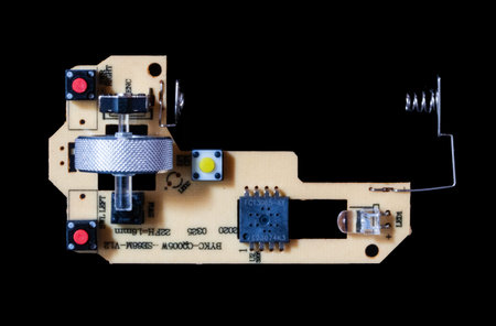 Electronic circuit board isolated on a black background. Close-up.