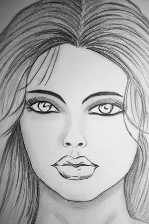 Portrait of a beautiful girl with long hair and blue eyes.の写真素材