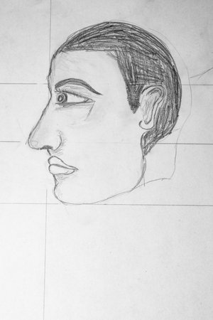 Sketch of a man's face on the white paper.の写真素材