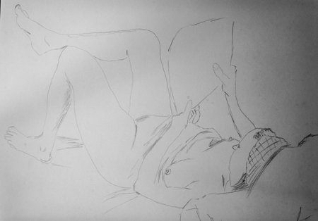 Sketch of a young man lying on the floor and reading a bookの写真素材