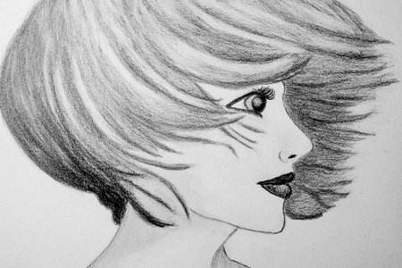 Beautiful girl with short hair. Pencil drawing on paper.の写真素材