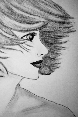 Sketch of a beautiful woman's face. Drawing on paper.の写真素材