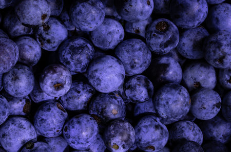 Blueberries background. Close up of fresh blueberries. Top view.
