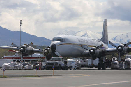 Everts Air Cargo Douglas DC6, built in the 1950's,  loading up for another freight run. Anchorage 2016のeditorial素材