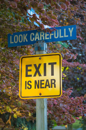 Collage  road sign  NO EXIT  changed to  EXIT IS NEAR の写真素材
