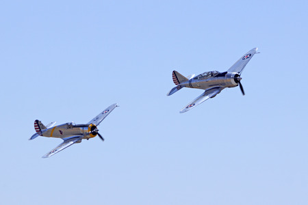 Airplane Vintage WWII aircraft flying at Air Showのeditorial素材