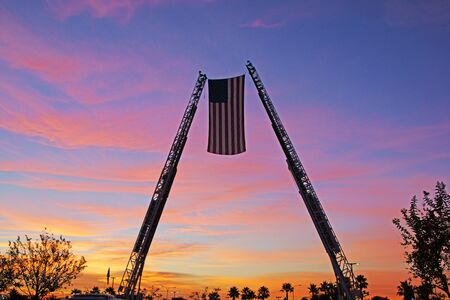American Flag and Fire Trucks at sunriseの写真素材