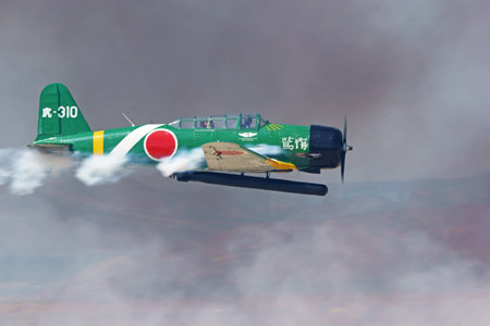 Airplane vintage Kate torpedo bomber attacking Pearl Harbor air show reenactment