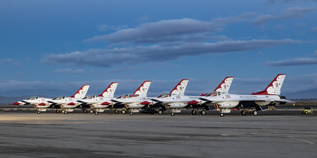 Airplane Thunderbirds F-16 Falcon jet fighters at sunriseのeditorial素材