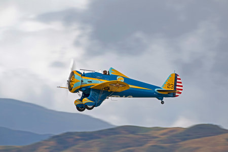Airplane vintage WWII P-26 Peashooter flyingのeditorial素材