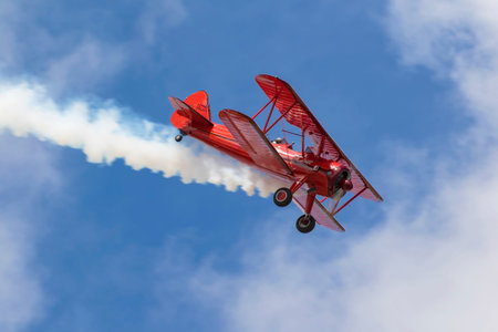 Airplane performing stunts at air show