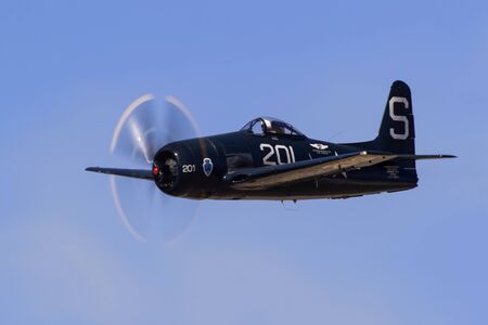 Airplane F8F Bearcat WWII fighter flyingのeditorial素材