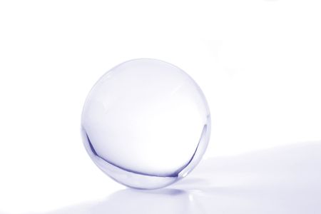 Crystal ball with blue light and shadowの写真素材