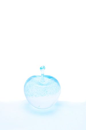 Glass apple with white copy space aboveの写真素材