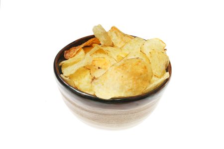 Bowl of kelttle chips isolated on whiteの写真素材