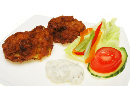 Onion bhaji riata dip and salad garnish