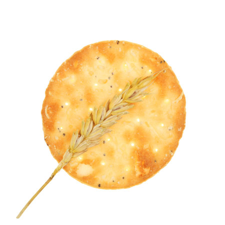 Round savory cheese biscuit and an ear of wheat