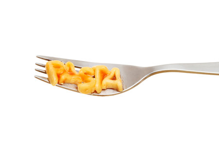 Alphabet spaghetti on a plate spells pasta isolated against white