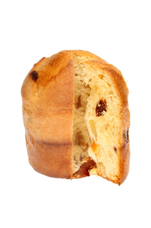 Panettone with a slice cut out isolated against whiteの写真素材