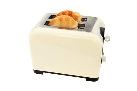 Electric toaster with two slices of toast isolated against white