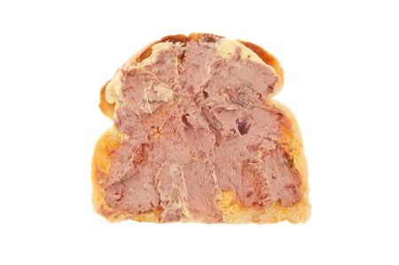 Farmhouse pate on a slice of buttered toast isolated against whiteの写真素材