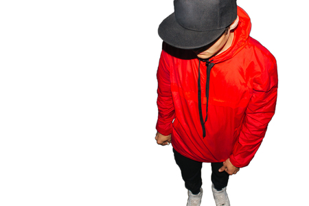 the guy is standing in red jacket and snapbackの写真素材