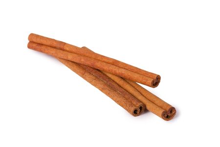 Several cinnamon sticks isolated on white backgroundの写真素材