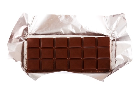 Chocolate bar in silver foil isolated on white backgroundの写真素材
