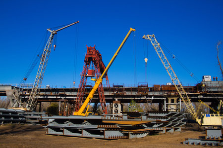 Gantry crane on a background of blue sky