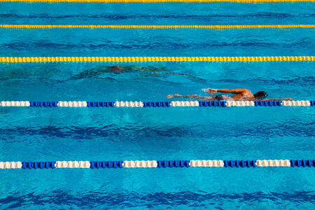 Swimming competition in the poolの写真素材