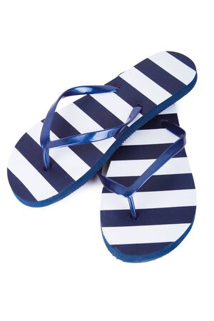 Women's rubber beach flip flops isolated on whiteの写真素材