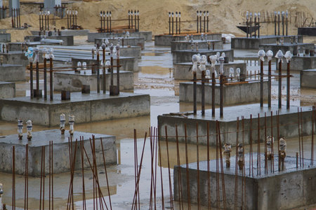 At the construction site. The foundation for the building.
