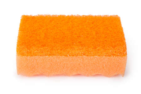 Orange sponge for washing dishes isolated on white backgroundの写真素材