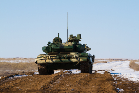 Russian tank at the landfill. Back view.のeditorial素材