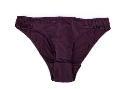 Beautiful female brown panties isolated on whiteの写真素材