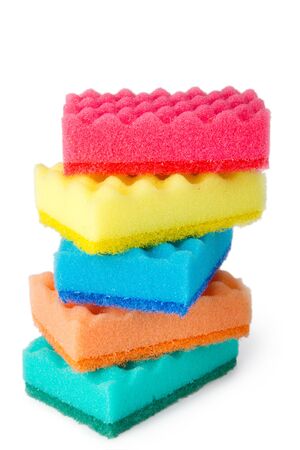 Colorful sponges for washing dishes isolated on white backgroundの写真素材