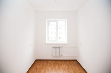 New apartment, empty room with hardwood floor