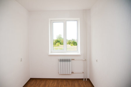 New apartment, empty room with hardwood floorの写真素材