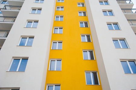 Brand new apartment building against the blue skyの写真素材