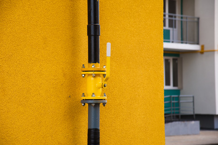 Crane mounted on the gas pipe leading to the houseの写真素材