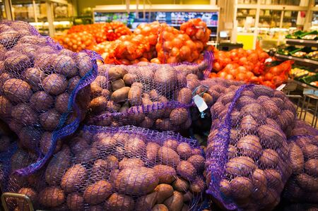 Bunch of fresh new potatoes in supermarketの写真素材