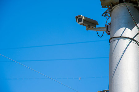 Traffic security camera surveillance (CCTV) on the road in the city