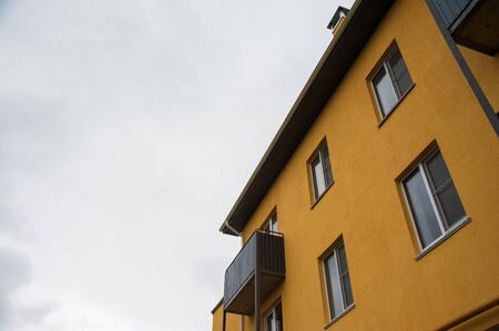 Brand new apartment building against the gray autumn skyの写真素材