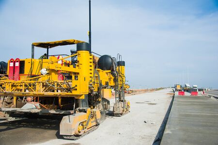 Road machinery working on the new road construction siteの写真素材