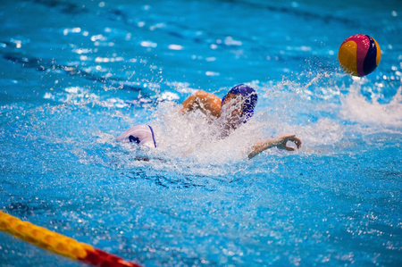 Water polo player in action during the women match betweenの写真素材